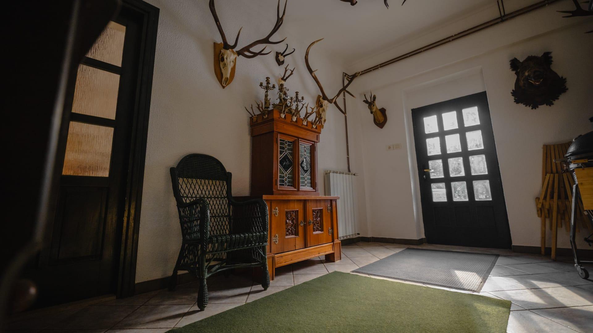 House under Javorniki background